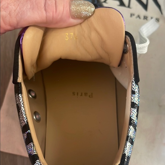 Black & Purple Women's Sneakers
made in Paris by Christian LOUBOUTIN
Red bottom - Picture 9 of 16